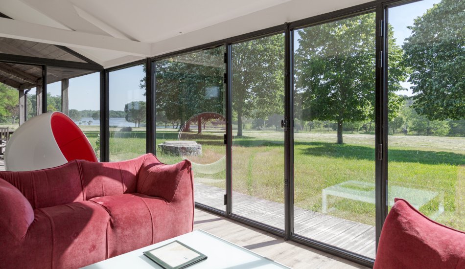 Veranda avec vue sur l'etang des Trois Frères